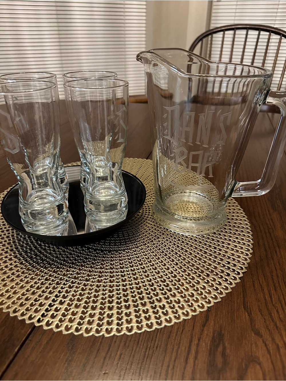 Clear Glass Pitcher with Etched 'Dan’s Bar' Design  and 4 etched “S” Glasses